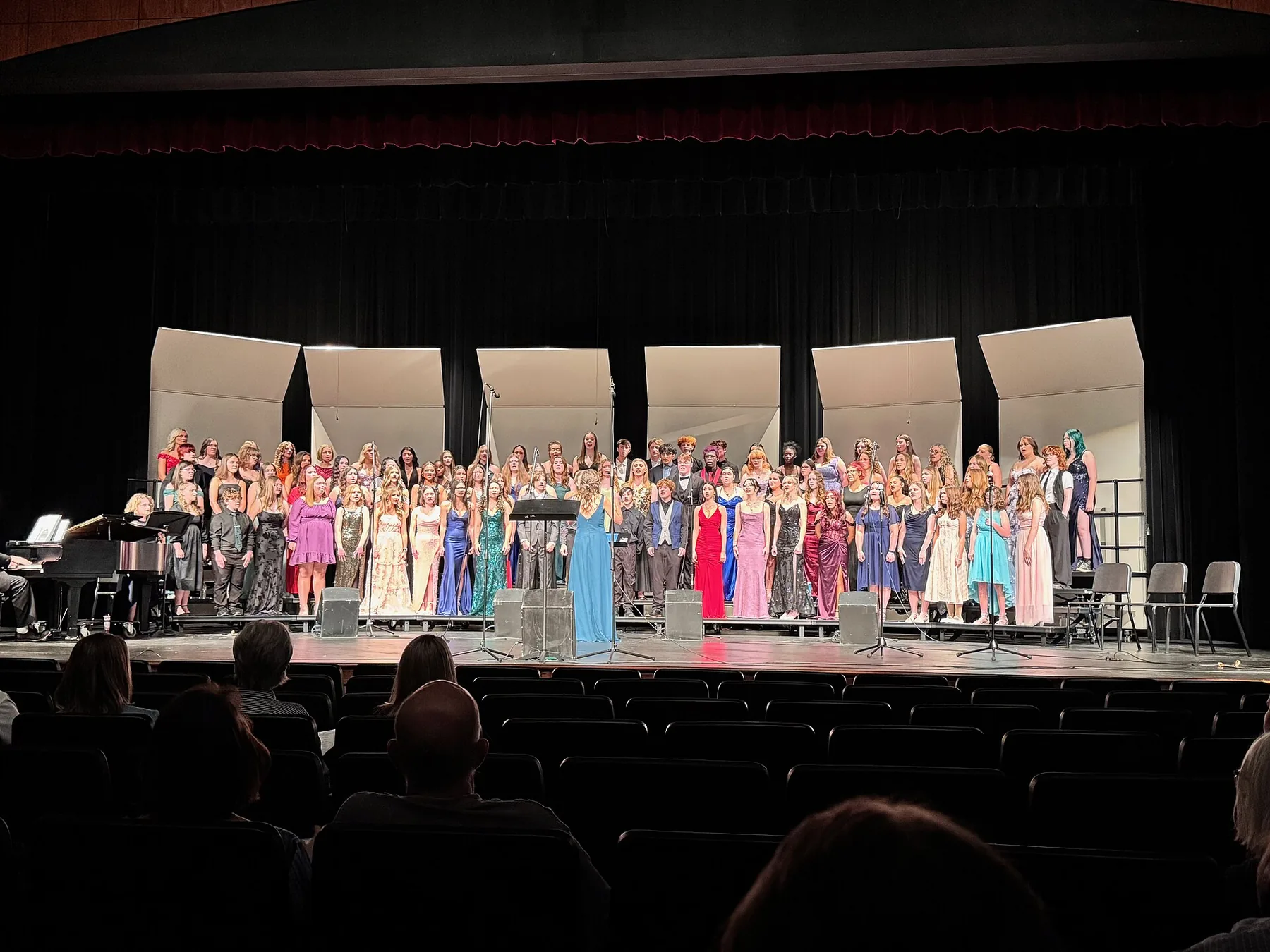 children's choir singing on stage