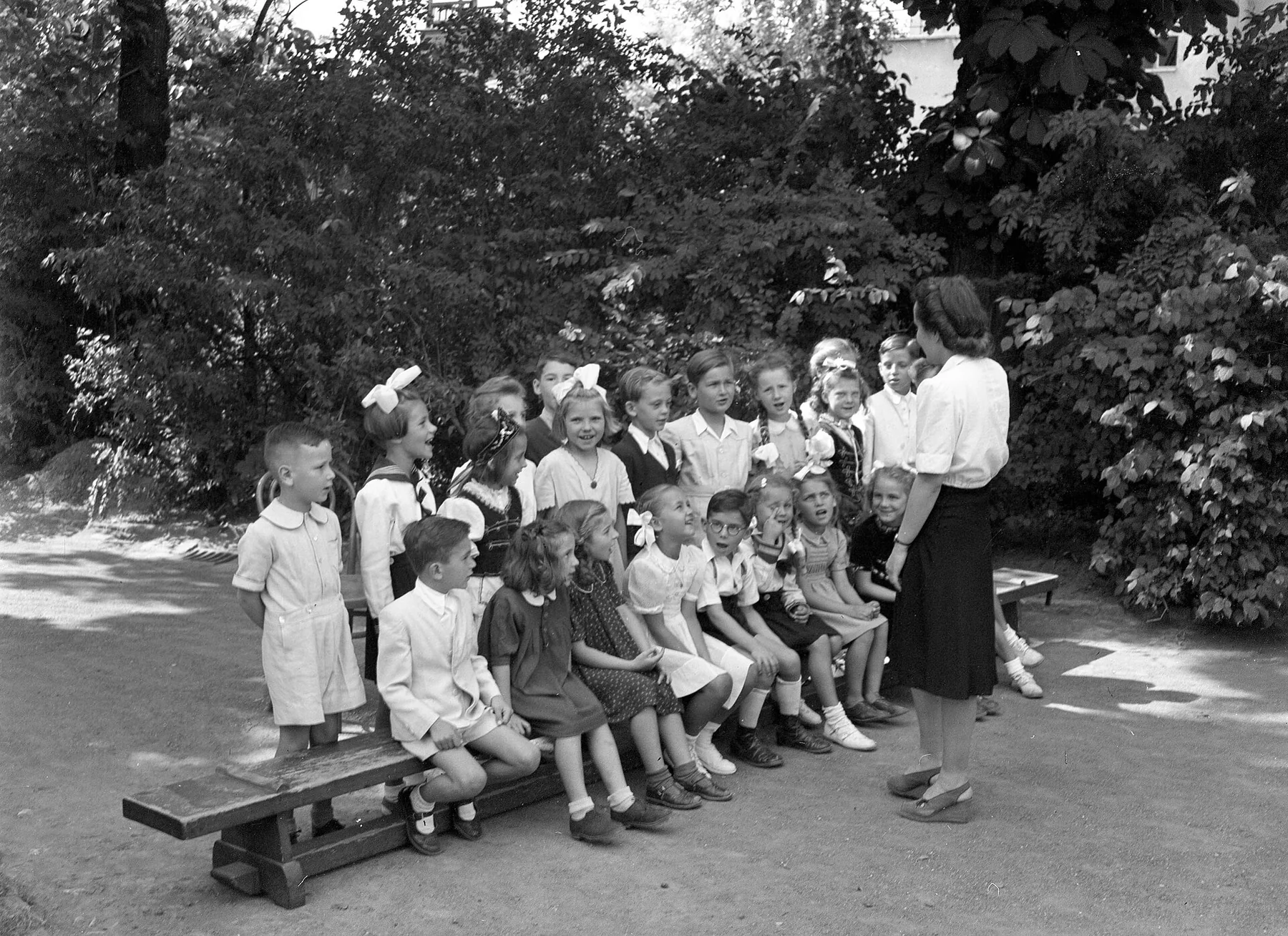 children’s choir group with teacher