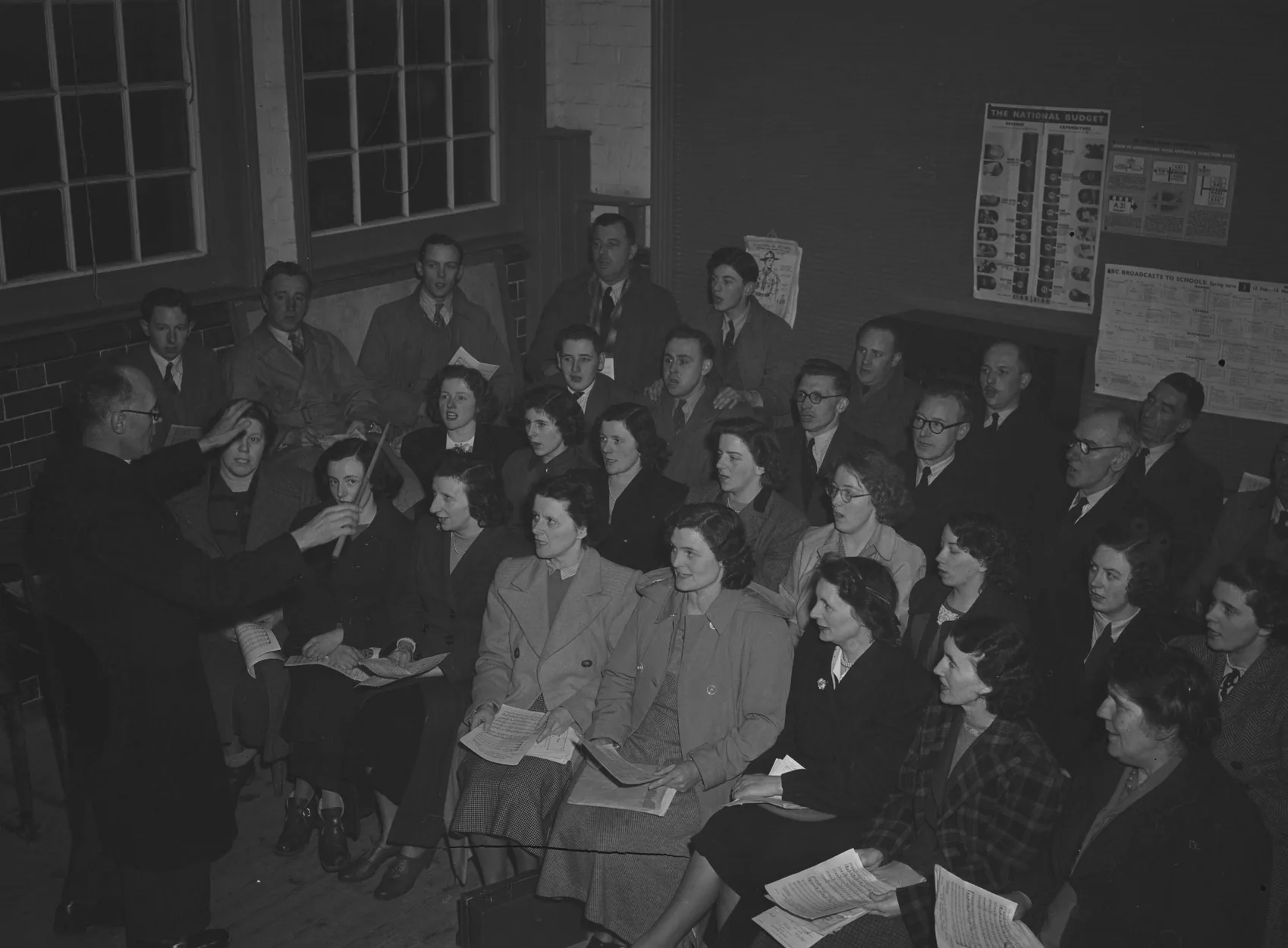 choir director leading a beginner choir