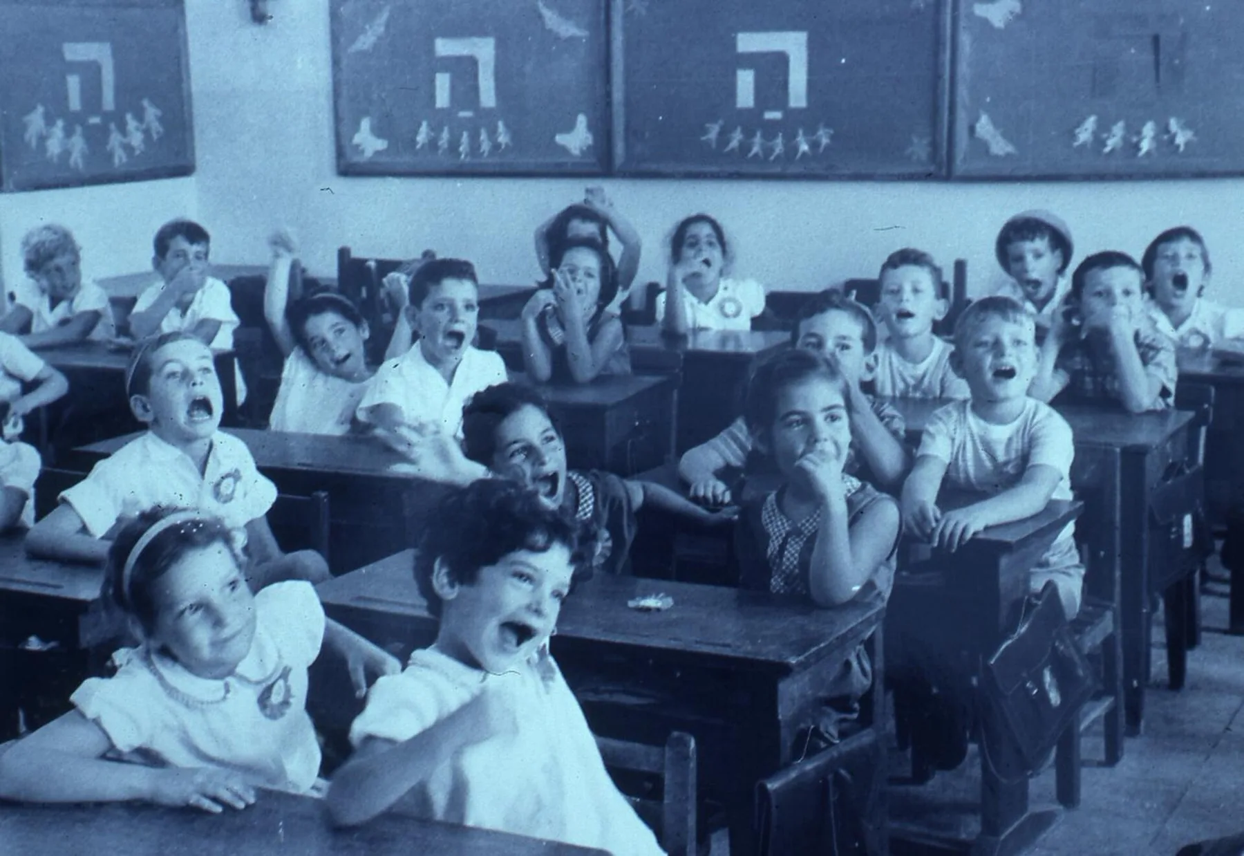 children singing in a preschool class children singing in a preschool class