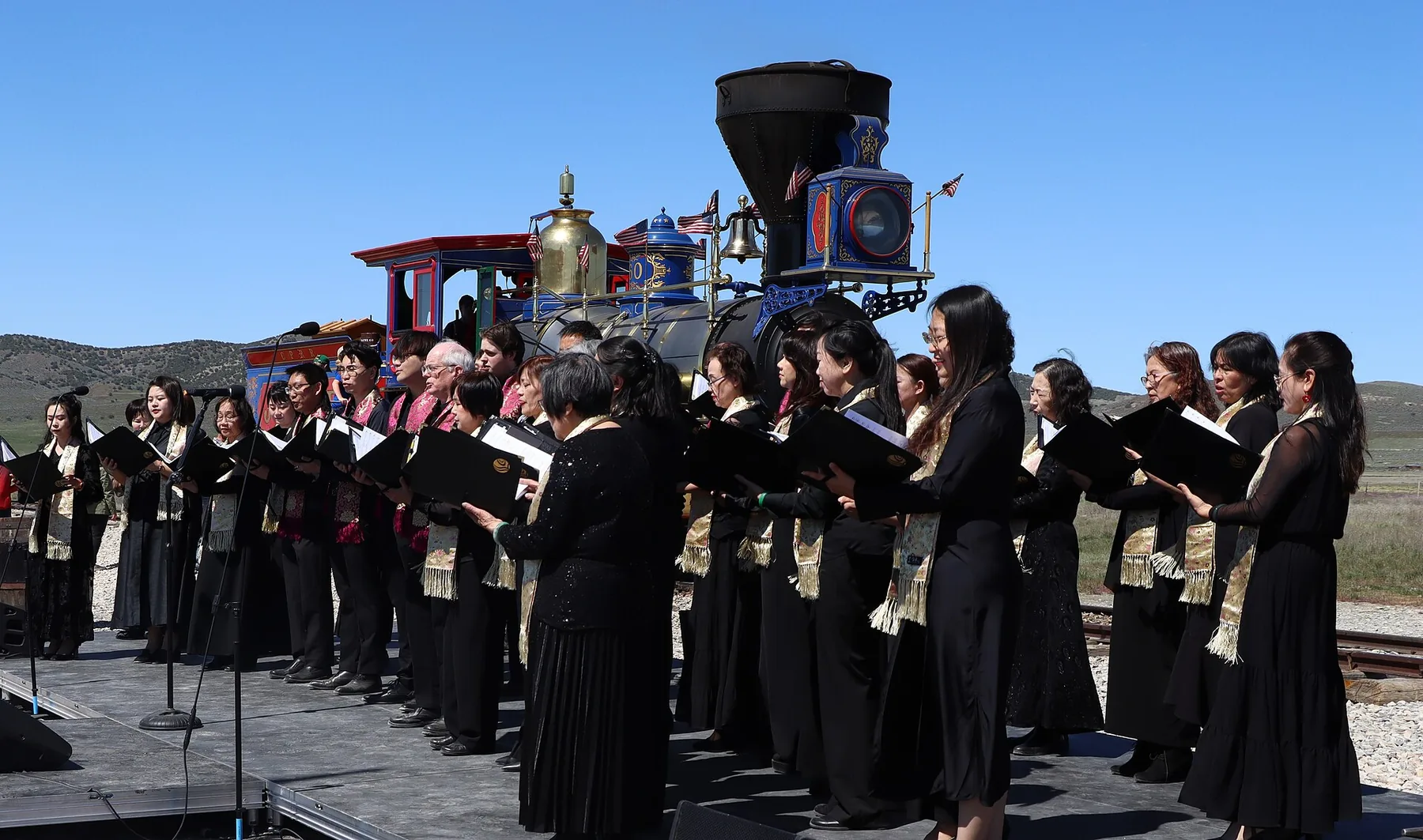 community choir in an outdoor concert community choir in an outdoor concert